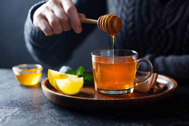 Mixing honey in tea