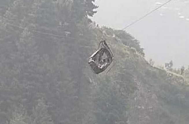 8 people including 6 students are hanging in the air after cable car breaks in Pakistan.