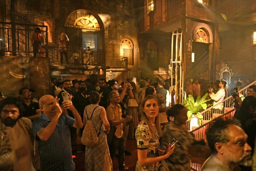 Foreign guests on pre-puja visit. Wednesday, at a puja mandap in North Kolkata