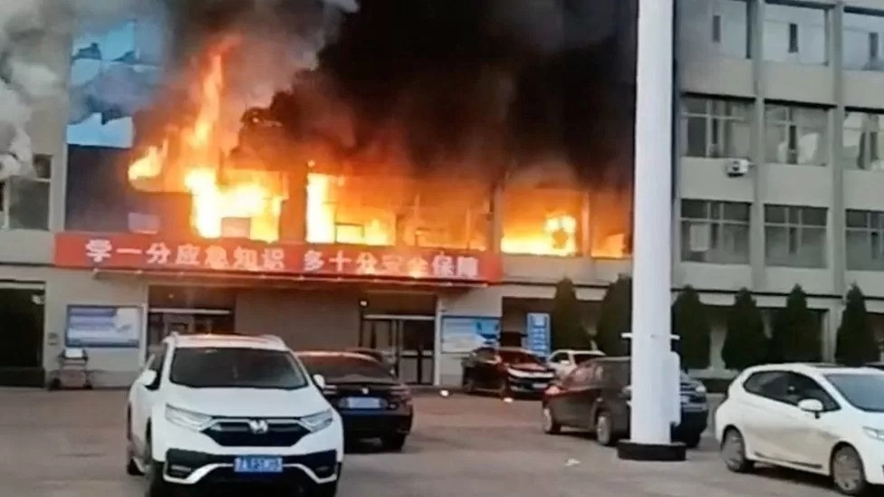 A coal company's office building Luliang City, Shanxi is engulfed by flames