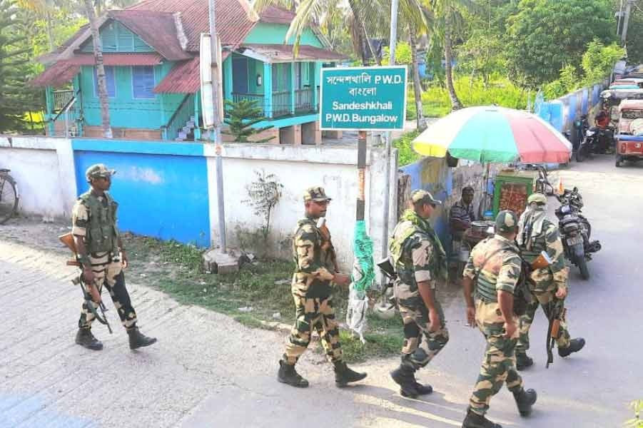 Central forces route march in Trimani Bazar area of Sandeshkhali on Wednesday afternoon.