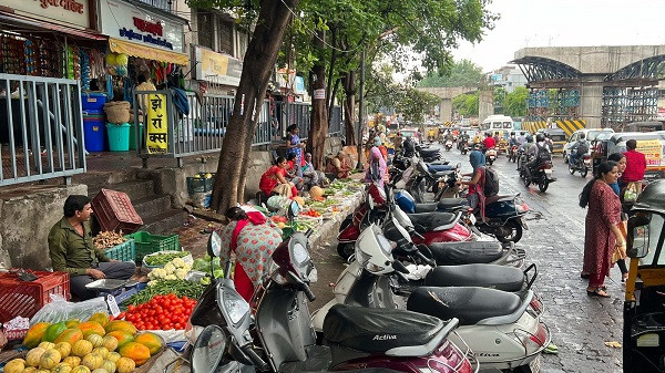 Gangarampur Municipal Corporation's campaign to clear the footpath encroachment