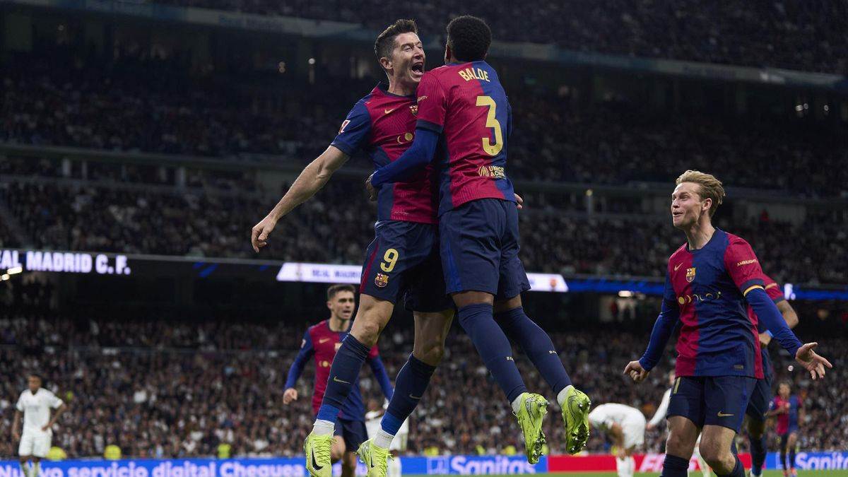 Barca beat Real to go top of La Liga