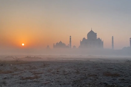 The Taj Mahal obscured by dense fog, Delhi-including North India in winter