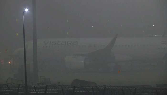 Delhi shivers in winter, heavy fog disrupts rail and flight services