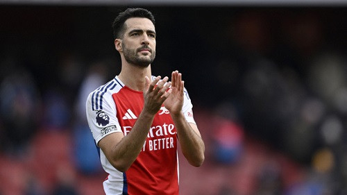 Arsenal's Mikel Merino celebrates after the match