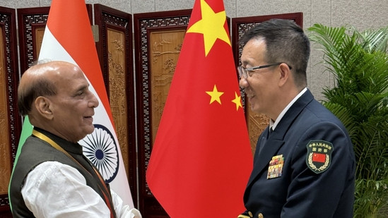 Defence Minister Rajnath Singh with China's Admiral Don Jun