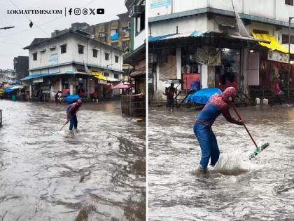 Spider-Man on roads seen draining water with a mop