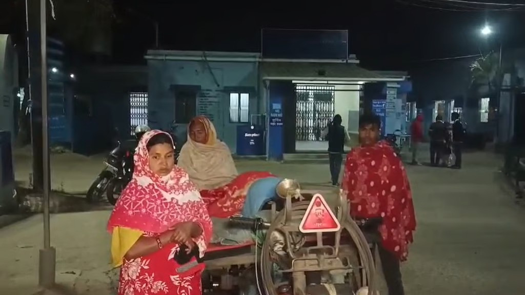 Family members in front of the hospital