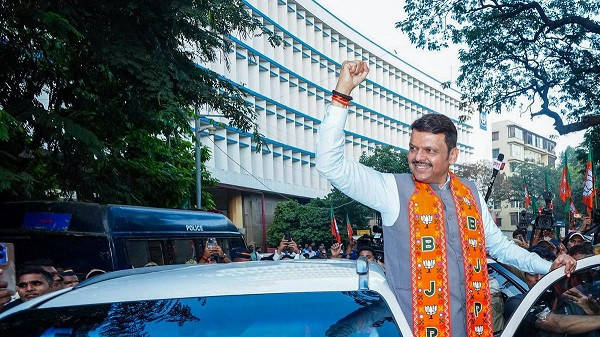 Maharashtra Chief Minister Devendra Fadnavis celebrates with BJP