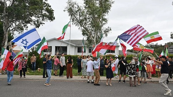 Iranian Australians react outside Iran's embassy in Canberra, Australia