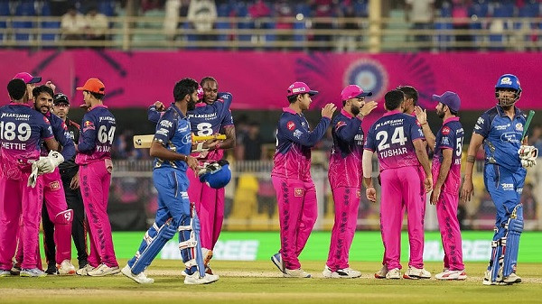 Rajasthan Royals' players celebrate their victory against Mumbai Indians during an IPL2026