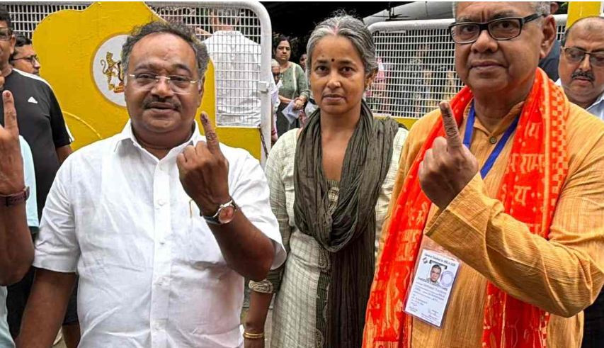 Shamik Bhattacharya casts his vote accompanied by his sister