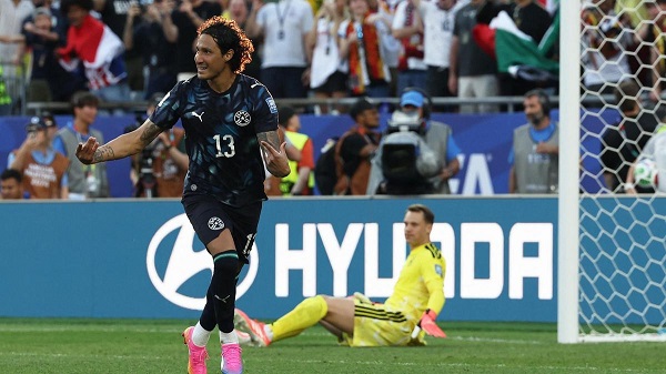 Paraguay's Jose Canale celebrates scoring a penalty