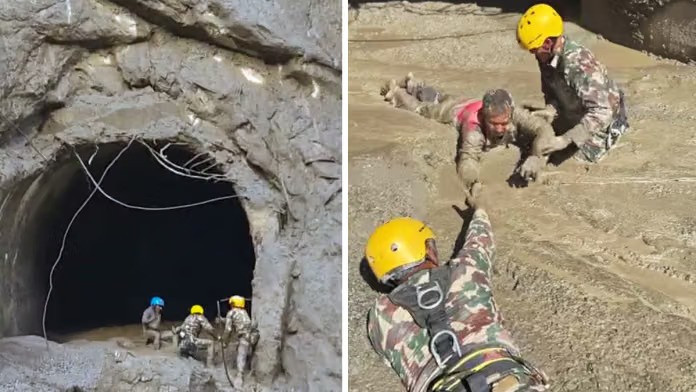Nepal Army personnel rescue people trapped inside the Rasuwa tunnel