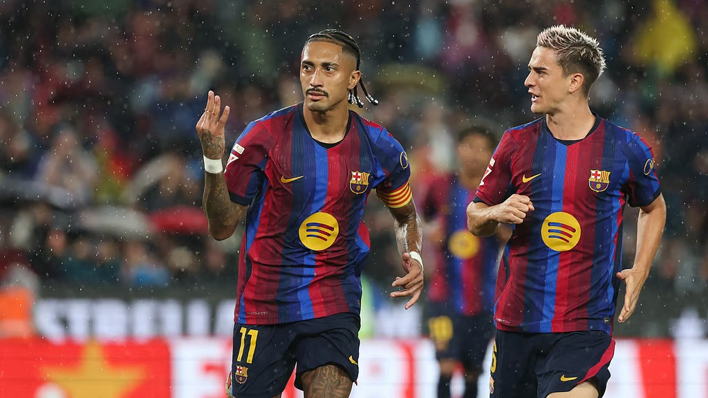 Barcelona hit seven in Racing Santander rout