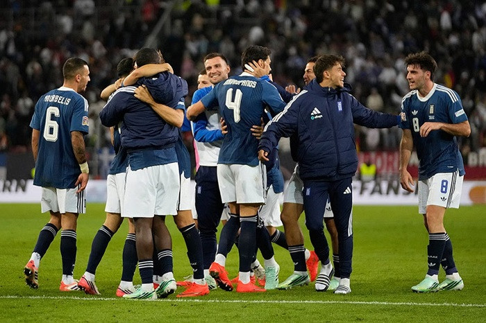 Greek players celebrate