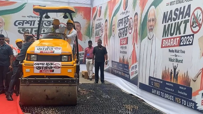Suvendu and Sukanta are driving the steamroller.