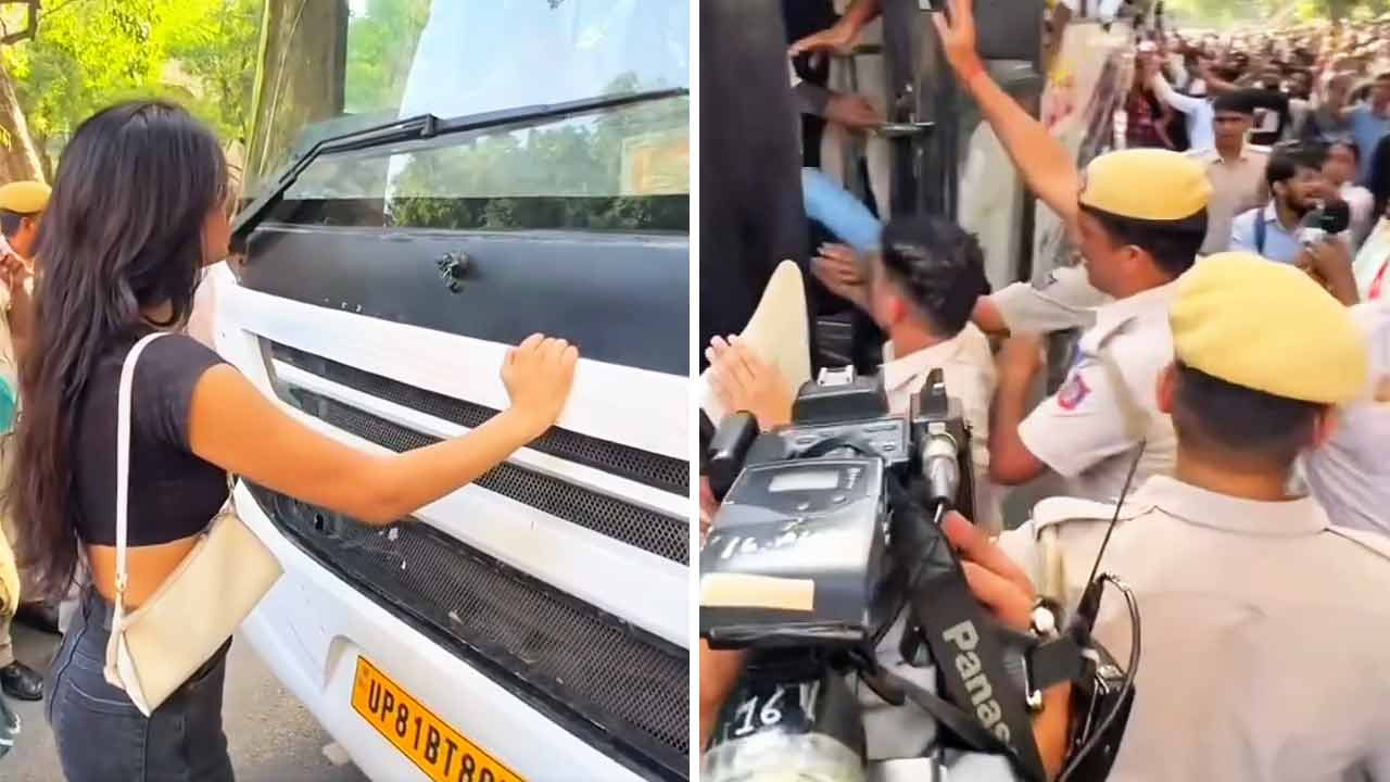 woman stops bus carrying detainees at Delhi’s Jantar Mantar during protest